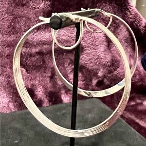 Sterling silver hoop earrings they have a 3 inch drop